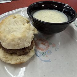 GRILL 57 - Sausage biscuit and grits.  Not greasy at all! Great flavor and taste.