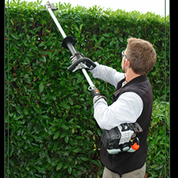 GLI Landscaping - a man trimming a hedge - Landscape Architects or Designers Near Me - Greensboro, North Carolina GLI Landscaping - a man trimming a hedge - Landscape Architects or Designers Near Me - Greensboro, North Carolina