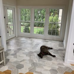 Straightline Painting & Tile - John installed tile in new sun room with Schulter heated flooring system.  Artist....