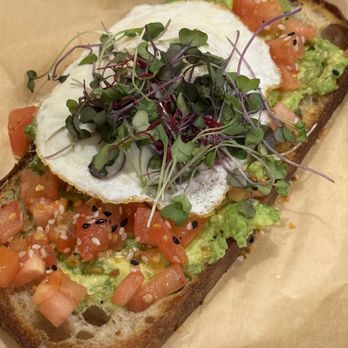 Petite Madeline Bakery & Bistro - Avocado toast with add-on over egg - Bakeries Near Me - Oceanside, California Petite Madeline Bakery & Bistro - Avocado toast with add-on over egg - Bakeries Near Me - Oceanside, California