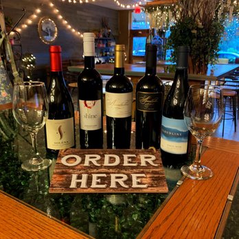Magnolia Wine Garden - order here sign and wine glasses - Wine Bars Near Me - Eustis, Florida