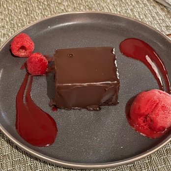 Sidney Tavern - Chocolate torte with ganache and raspberry - New American Near Me - East Berlin, Pennsylvania