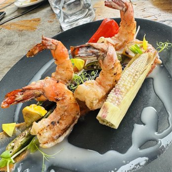 Ocean Grill - JUMBO SHRIMP Delicious jumbo shrimp with a roasted garlic, butter, lime, chile de árbol and coconut cream sauce, served with grilled veggies - Steakhouses Near Me - Puerto Vallarta, JAL Ocean Grill - JUMBO SHRIMP Delicious jumbo shrimp with a roasted garlic, butter, lime, chile de árbol and coconut cream sauce, served with grilled veggies - Steakhouses Near Me - Puerto Vallarta, JAL