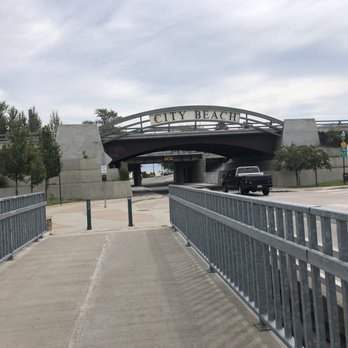 Sandpoint RV park - Bike trails and city beach entrance, rv park is just under that bridge on the right - RV Parks Near Me - Sandpoint, Idaho