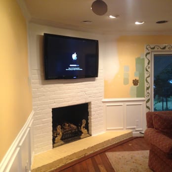 WSC Smart Home Designers - TV Mount retrofit over fireplaceon brick surface - Electronics Near Me - Chesapeake, Virginia