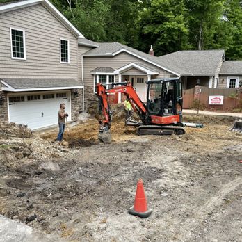Your Waterproofer - a man standing in front of a construction site - Waterproofing Near Me - Independence, Ohio Your Waterproofer - a man standing in front of a construction site - Waterproofing Near Me - Independence, Ohio