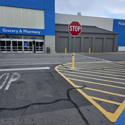 Walmart Supercenter - Wide wide view of the entrance.