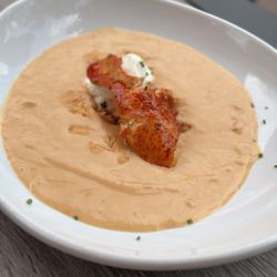 Copper Mug Bar And Grille - Lobster Bisque served with chives and crème.