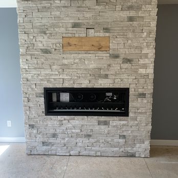CK Masonry Construction - Modern style fireplace with the TV mounted above.
A lovely addition to this master bedroom. - Masonry/Concrete Near Me - Wooster, Ohio CK Masonry Construction - Modern style fireplace with the TV mounted above.
A lovely addition to this master bedroom. - Masonry/Concrete Near Me - Wooster, Ohio