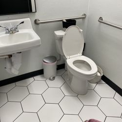 Clean fancy bathroom with free menstrual supplies