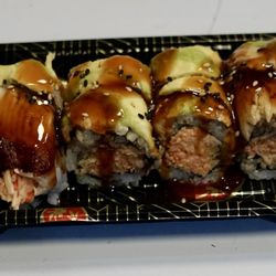 Okinawa Hibachi Sushi - Black dragon roll ; spicy crab meat, crunch, eel, avocado