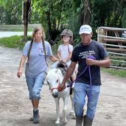 Happi Farm - Baby G enjoying her pony ride.
