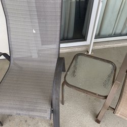 Beach Front Rentals & Sales - This is the patio furniture after wiping off, rusty, paint stains, debris on it. Not ready for a vacation rental stay.