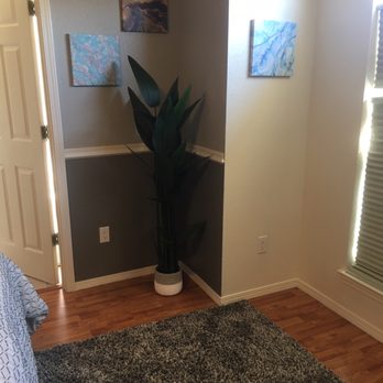 Color Transformations - This was a corner in the bedroom the old colors were dark blue and green. These were new colors. - Painters Near Me