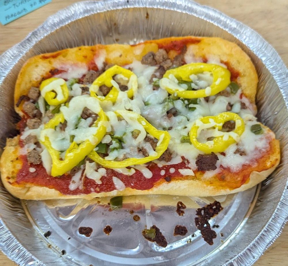 Pizza At The Cove Logo