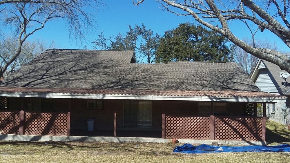 Slide of Tim's Roofing