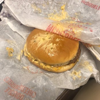 McDonald's - a cheeseburger wrapped in wax paper - Fast Food Near Me - Tampa, Florida McDonald's - a cheeseburger wrapped in wax paper - Fast Food Near Me - Tampa, Florida