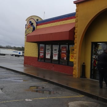 Church's Chicken - a man standing in front of a store - Fast Food Near Me - Tifton, Georgia