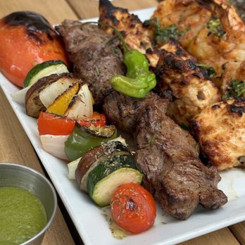 Amal - Skewer Platter for 4: 2 pistachio kabab (beef & lamb) 2 tawok, 2 beef tenderloin and 4 tiger shrimps - Lebanese Near Me - Toronto, Ontario