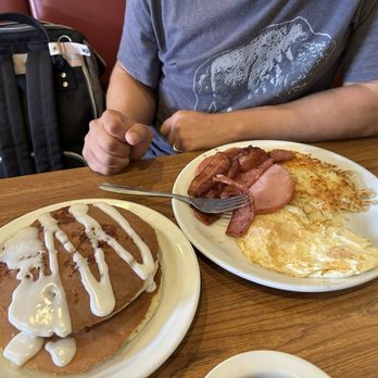 Denny's - Lumberjack Slam for my hubby. Not pictured: Moons Over my Hammie sandwich for me MINUS the Hammie (no meat) add tomatoes. - American Near Me - Bellflower, California