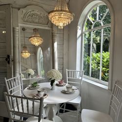 Little White House Salon Cafe - Hydrangeas and mismatched vintage tea cups