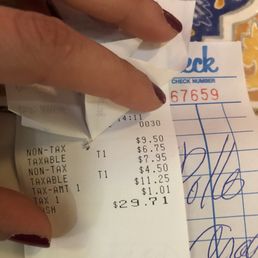 all menu prices are whited out - Wouldn't give me a price break down and got upset when I asked to take the receipt all menu prices are whited out - Wouldn't give me a price break down and got upset when I asked to take the receipt