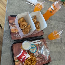 Chicking - A daily special - 9 tenders, 1 sandwich, a side (tandoori fries), and a 1-liter bottle of soda