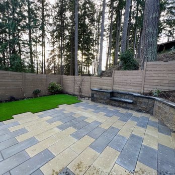 Modern Lots - Patio, retaining wall, turf and plants - Landscaping Near Me - Redmond, Washington Modern Lots - Patio, retaining wall, turf and plants - Landscaping Near Me - Redmond, Washington