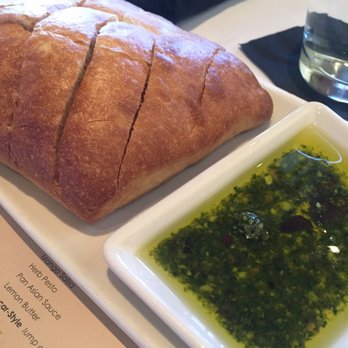 Bonefish Grill - Signature Artisan Bread with Pesto Dipping Oil - Seafood Near Me - Huntersville, North Carolina Bonefish Grill - Signature Artisan Bread with Pesto Dipping Oil - Seafood Near Me - Huntersville, North Carolina