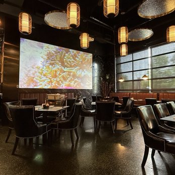 Koi Sushi Thai & Bar - Dining area with a big projector screen - Thai Near Me - Nocatee, Florida Koi Sushi Thai & Bar - Dining area with a big projector screen - Thai Near Me - Nocatee, Florida