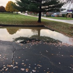 1St Choice Asphalt - This is our drain that they "fixed". We paid over $7000 for their services for the drain and parking lot. Don't give them your business!!