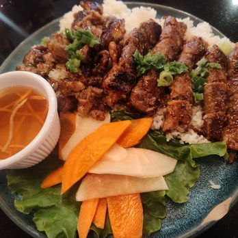 Green Basil Dimsum & Pho - Grilled pork chops on broken rice with added grilled beef - Dim Sum Near Me - Fairfax, Virginia Green Basil Dimsum & Pho - Grilled pork chops on broken rice with added grilled beef - Dim Sum Near Me - Fairfax, Virginia