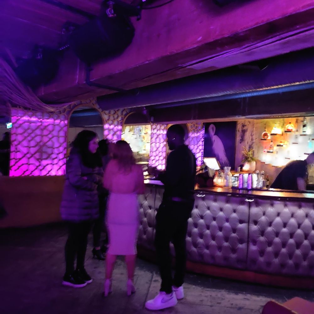 Hello Goodbye - a group of people standing in front of a bar - Bars Near Me - Vancouver, British Columbia