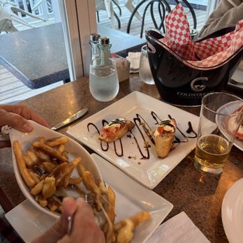 Main Street Restaurant & Bakery - Poutine & lobster bruschetta - Seafood Near Me - Ingonish Beach, Nova Scotia Main Street Restaurant & Bakery - Poutine & lobster bruschetta - Seafood Near Me - Ingonish Beach, Nova Scotia