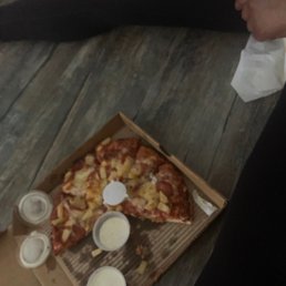 a slice of pizza in a box