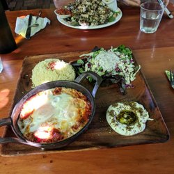 Cafe Jerusalem - Mmm Shakshuka...w rice subbed for bread. Cafe Jerusalem