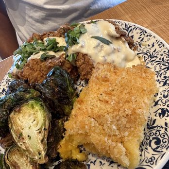 Tupelo Honey Southern Kitchen & Bar - Smothered chicken - New American Near Me - Irving, Texas Tupelo Honey Southern Kitchen & Bar - Smothered chicken - New American Near Me - Irving, Texas