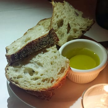 FnB - Some bread and EVOO under the light on Yuko's phone. - Gastropubs Near Me - Scottsdale, Arizona FnB - Some bread and EVOO under the light on Yuko's phone. - Gastropubs Near Me - Scottsdale, Arizona