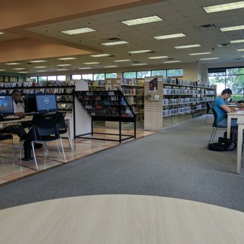 South Creek Library - Rough view from the back of the library. You can see, to the right, that space is dedicated to work desks - Libraries Near Me - Orlando, Florida South Creek Library - Rough view from the back of the library. You can see, to the right, that space is dedicated to work desks - Libraries Near Me - Orlando, Florida