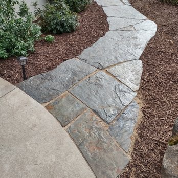 Unique Landscapes - Flagstone pathway - Landscaping Near Me