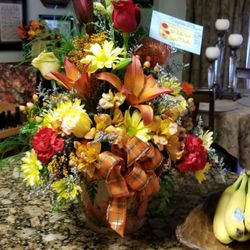 Caspian Flowers & Gifts - Arrangement order by phone exceeded expections!!