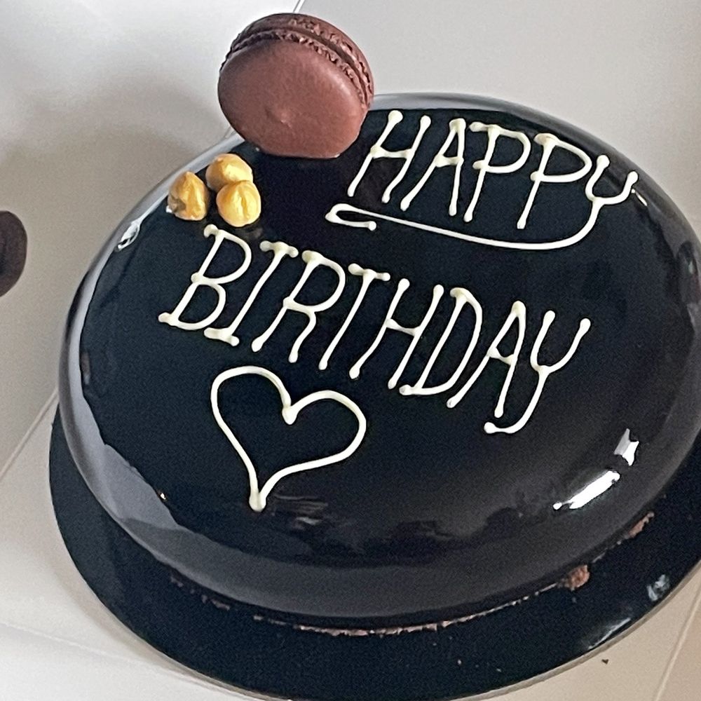 A Delicious chocolate mousse birthday cake.