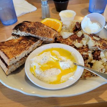 Otis Cafe - Poached eggs with hashbrowns and homemade sourdough toast . I asked for it to be toasted dark with butter on the side - Breakfast & Brunch Near Me - Lincoln City, Oregon Otis Cafe - Poached eggs with hashbrowns and homemade sourdough toast . I asked for it to be toasted dark with butter on the side - Breakfast & Brunch Near Me - Lincoln City, Oregon