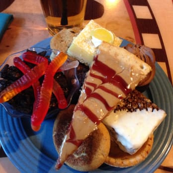 Goofy's Kitchen - Pb pizza, worms and dirt, Rice Krispie treat, lemon bar, pumpkin pie, and cookies!!! - American Near Me - Anaheim, California Goofy's Kitchen - Pb pizza, worms and dirt, Rice Krispie treat, lemon bar, pumpkin pie, and cookies!!! - American Near Me - Anaheim, California