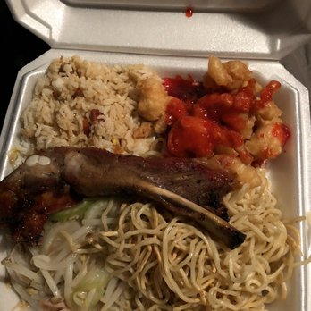 China Cafe - a styrofoam takeout container with noodles, meat, and vegetables - Chinese Near Me - Porterville, California