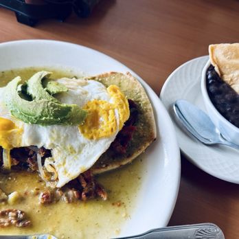 Buenos Días Mexican Cuisine - Tasty Breakfast Huaraches with Pastor, grilled onion, egg over medium and Salsa Verde only. Black beans with chips on the side. - New Mexican Cuisine Near Me - Vancouver, Washington
