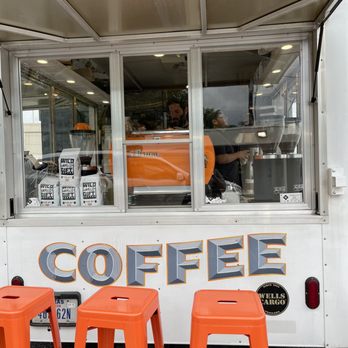 Theory Coffee Company - orange stools in front of a coffee truck - Food Trucks Near Me - San Antonio, Texas