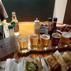 Parrilla 107 - I tried the 6 flight of craft beers just to get a feel for what this place has to offer, would recommend.
