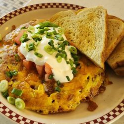 St. Francis Fountain - The Chef's Mess. Eggs, bacon, potatoes, tomatoes, onions, peppers and delicious.