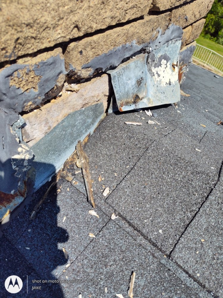 Slide of Mike's roofing and repairs